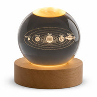Crystal ball night light with solar system engraving