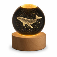 Crystal ball night light with whale engraving